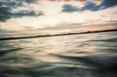 Scenic view of sea against dramatic sky