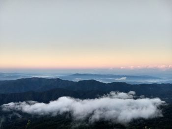 Scenic view of mountains against sky during sunset