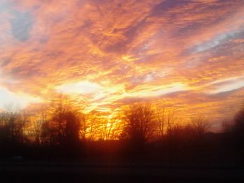 Scenic view of landscape at sunset