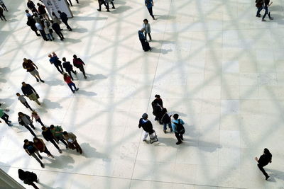 High angle view of people walking in airport