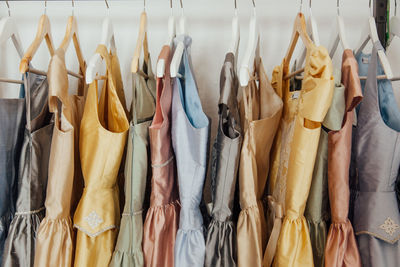 Close-up of colorful dress hanging on display at store