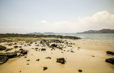 Scenic view of beach against sky