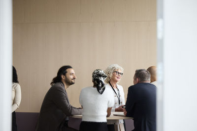 Business people talking during coffee break