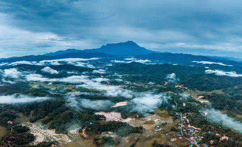 High angle view of mountains against sky