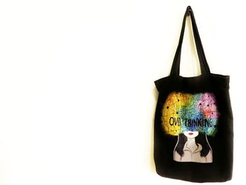 Close-up of multi colored art against white background