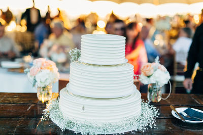 Close-up of cake on table in ceremony