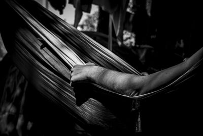 Close-up of man playing piano