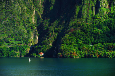 High angle view of boat in lake como against mountain