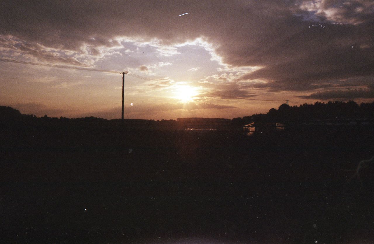 SILHOUETTE LANDSCAPE AGAINST SKY DURING SUNSET