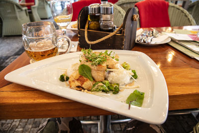 Close-up of food served on table