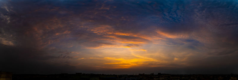 Scenic view of dramatic sky during sunset