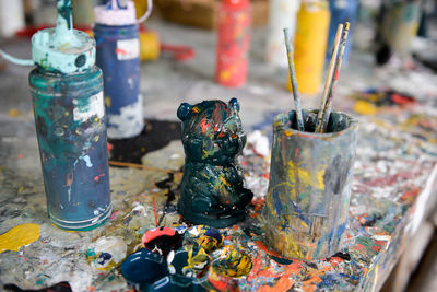 Close-up of paintbrushes on table