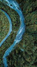 High angle view of rock by sea