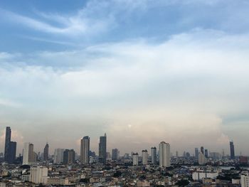 Cityscape against sky during sunset