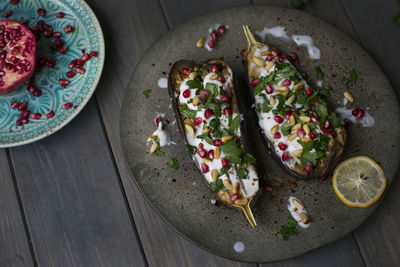 Delicious baked eggplant served on plate