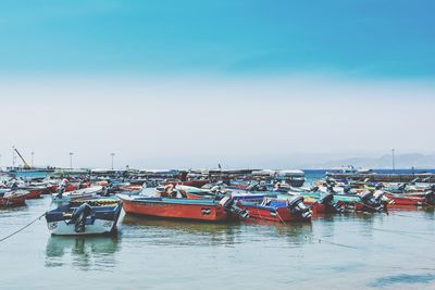 Boats moored in harbor