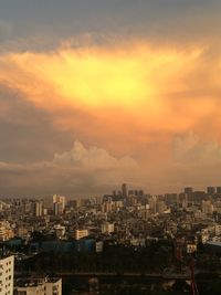 Cityscape against sky during sunset