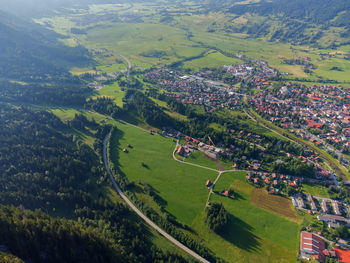 High angle view of buildings on field