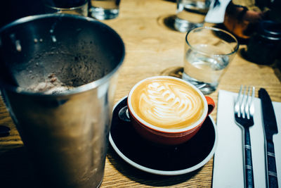 Close-up of coffee cup on table