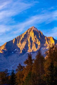 Scenic view of mountains against sky during autumn