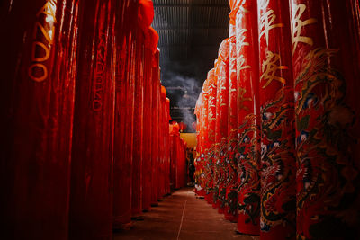 Row of red hanging outside building