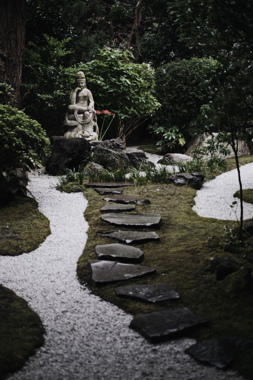 water, plant, solid, no people, nature, belief, religion, art and craft, rock, sculpture, spirituality, stone - object, architecture, stepping stone, day, tree, human representation, japanese garden, statue, outdoors