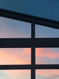 Low angle view of sky seen through window