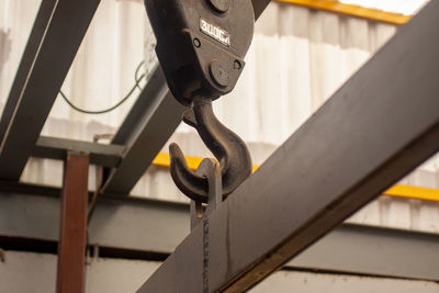 Low angle view of machinery on railing