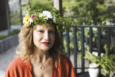 Portrait of mature woman wearing flower tiara during swedish midsummer celebration