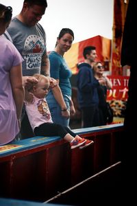 People at market stall