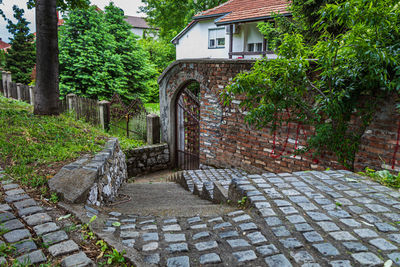 View of footpath by building