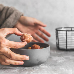 Close-up of hand holding ice cream