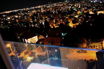 High angle view of illuminated cityscape