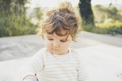 Portrait of cute boy looking at camera