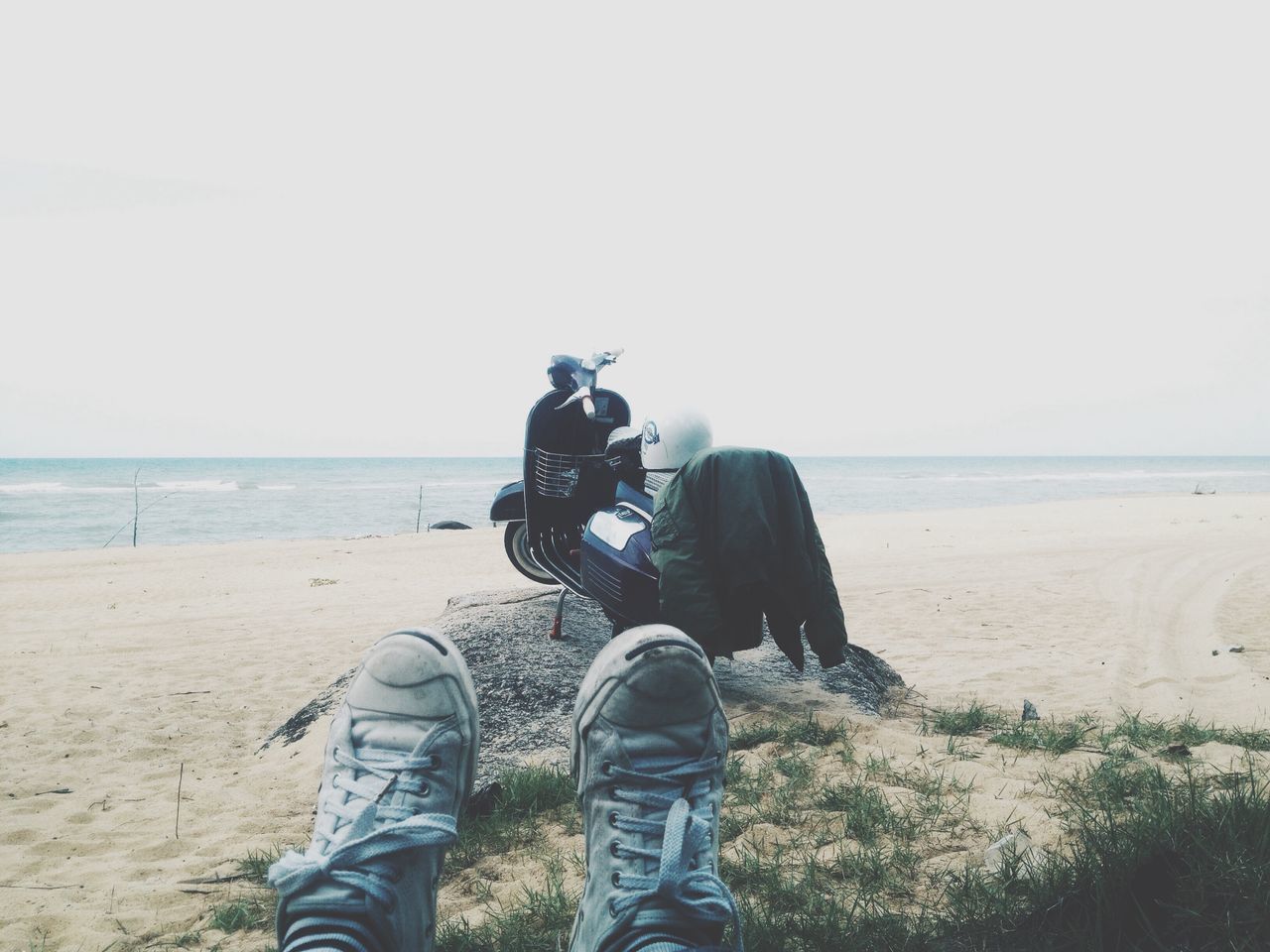 sea, horizon over water, beach, water, personal perspective, sitting, men, clear sky, shoe, togetherness, riding, shore, relaxation, sand, tranquility, person, vacations, tranquil scene