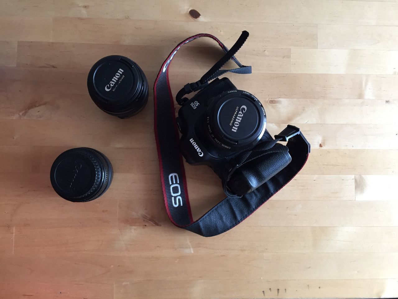 indoors, still life, technology, communication, table, high angle view, close-up, old-fashioned, retro styled, number, no people, directly above, equipment, connection, black color, text, wood - material, photography themes, antique, single object