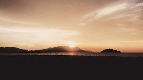 Scenic view of dramatic sky during sunset