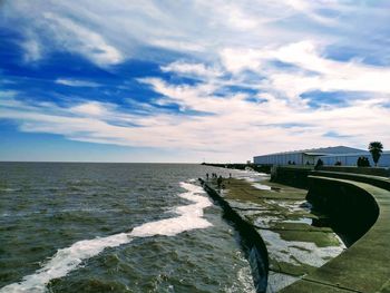 Scenic view of beach against sky