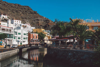 View of town with mountain in background