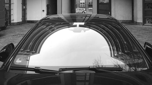 Reflection of buildings on glass window