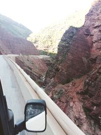 Road seen through car windshield