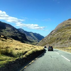 Country road passing through landscape