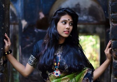 Young woman standing outdoors