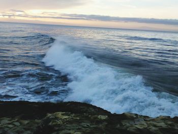 Waves splashing on rocks