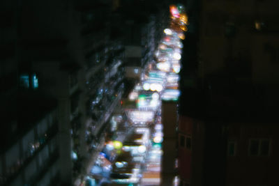 Defocused image of traffic on road at night