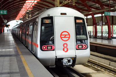 Delhi metro train arriving at jhandewalan metro station in new delhi, india, asia, public metro