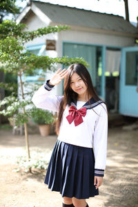 Portrait of a girl standing outdoors