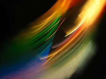 Close-up of light painting against black background