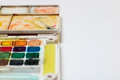 High angle view of paintbrushes on table