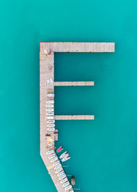 Aerial view of boats moored at harbor